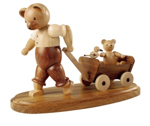 Bear, male, with child on wooden handcart